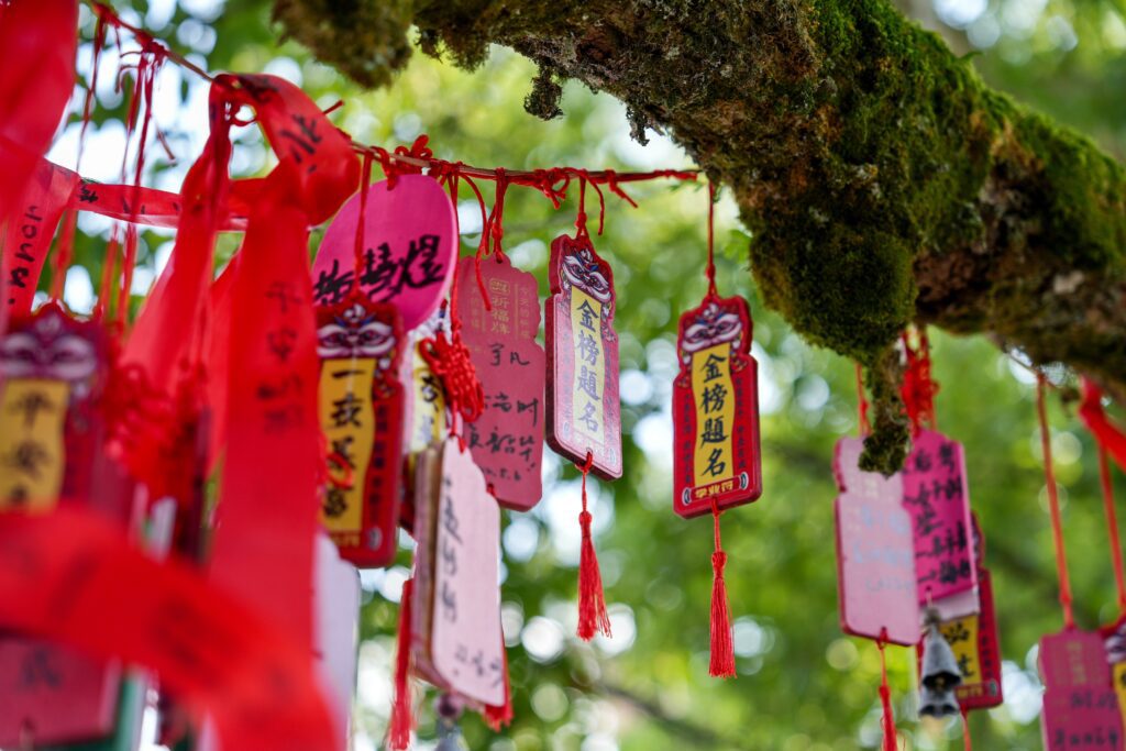 Traditional Japanese Tablets with Prayers and Wishes Hanging from a Tree