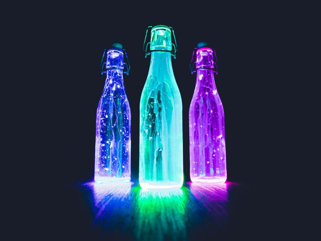 3 neon bottles decoration idea for event theme