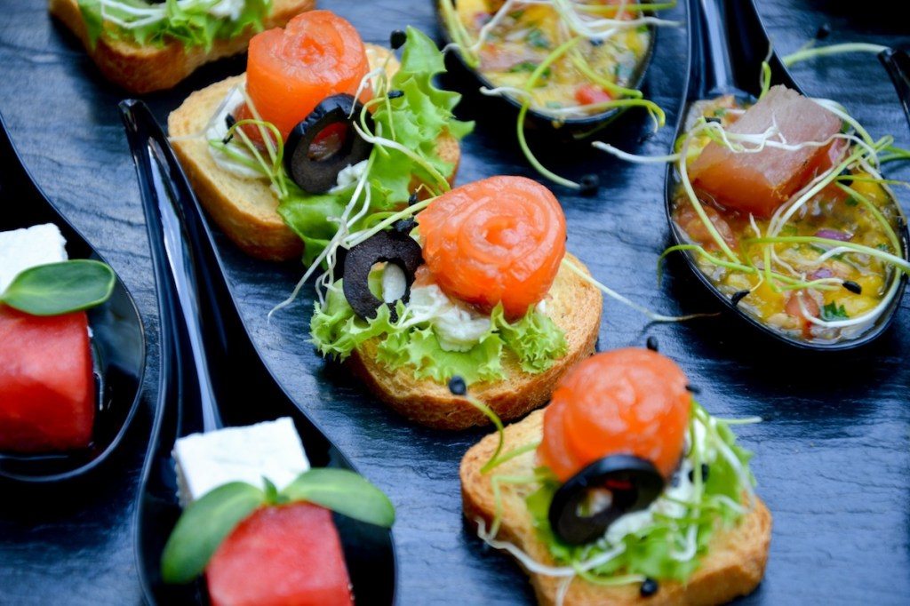 Delicious looking canapes laid out on a slate.jpg