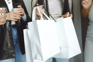 Woman Holding Paper Shopping Bags