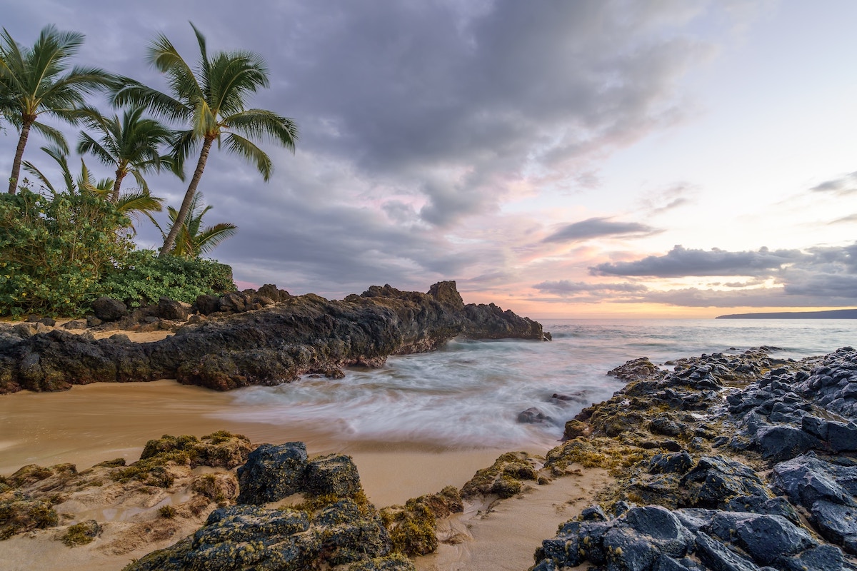 Long exposure photography of seaside photo of secret beach at Maui