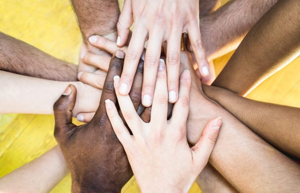 Many hands together