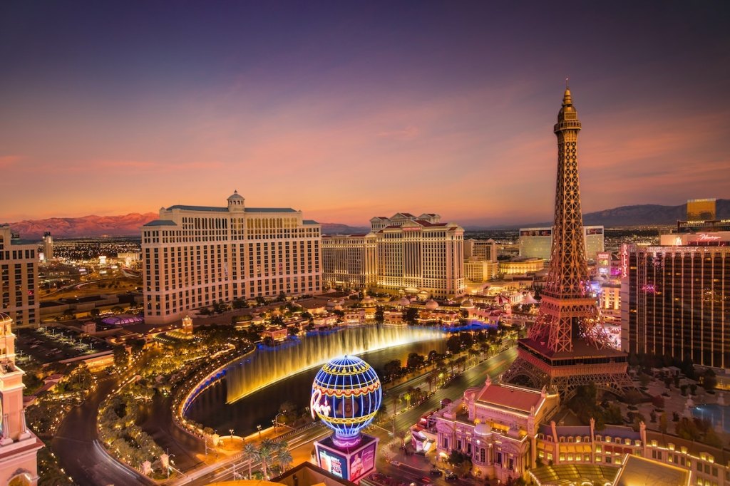 The Bellagio Fountains shows in Las Vegas at dawn.