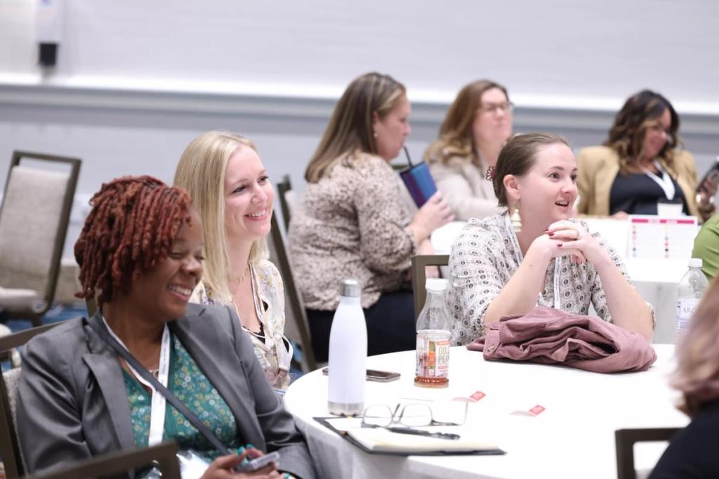 Peple sitting around a table during Innovation Lab.