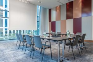 Small meeting room set up in boardroom style at a Radisson Hotel Group property