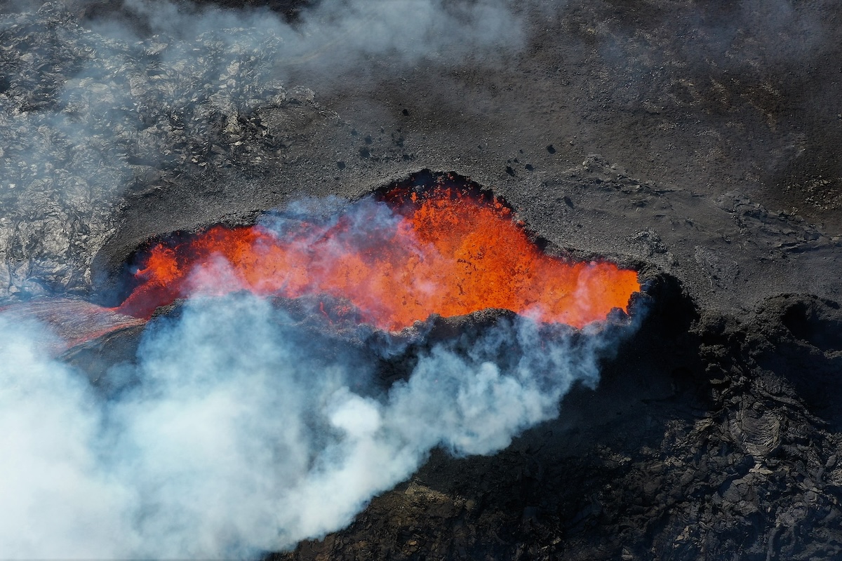 Volcano Erupts in Iceland - An aerial view of a lava flow in the ocean photo