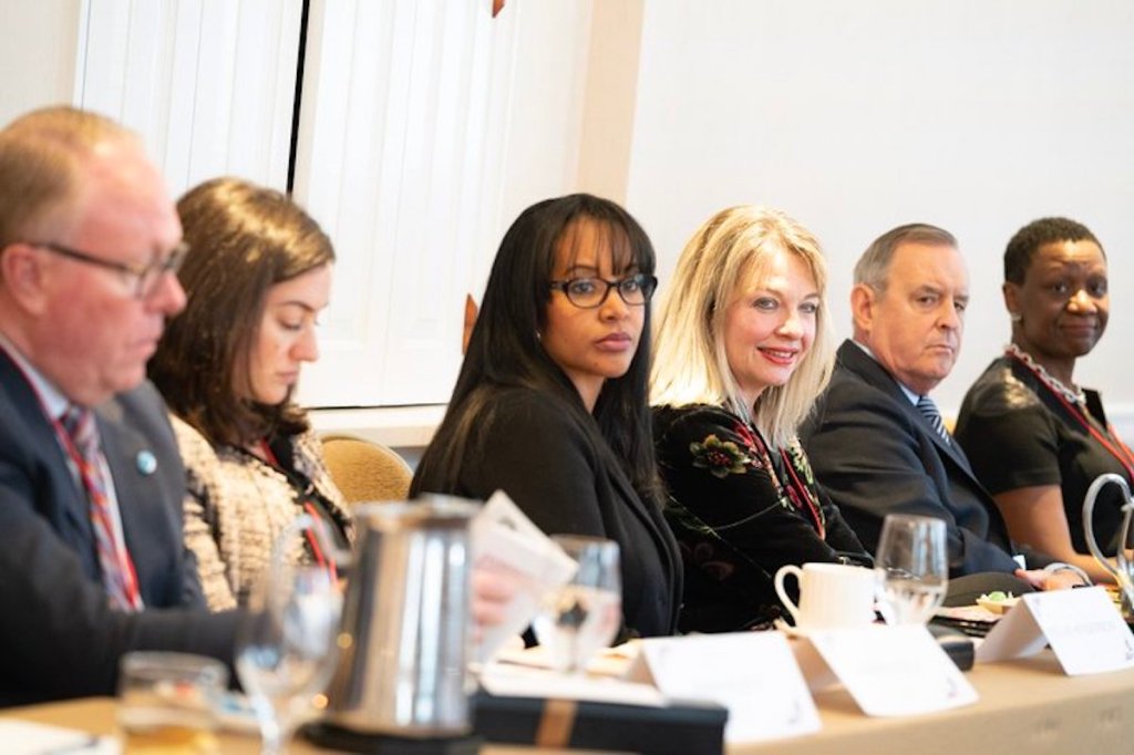 Image of a diverse group of people at a meeting.