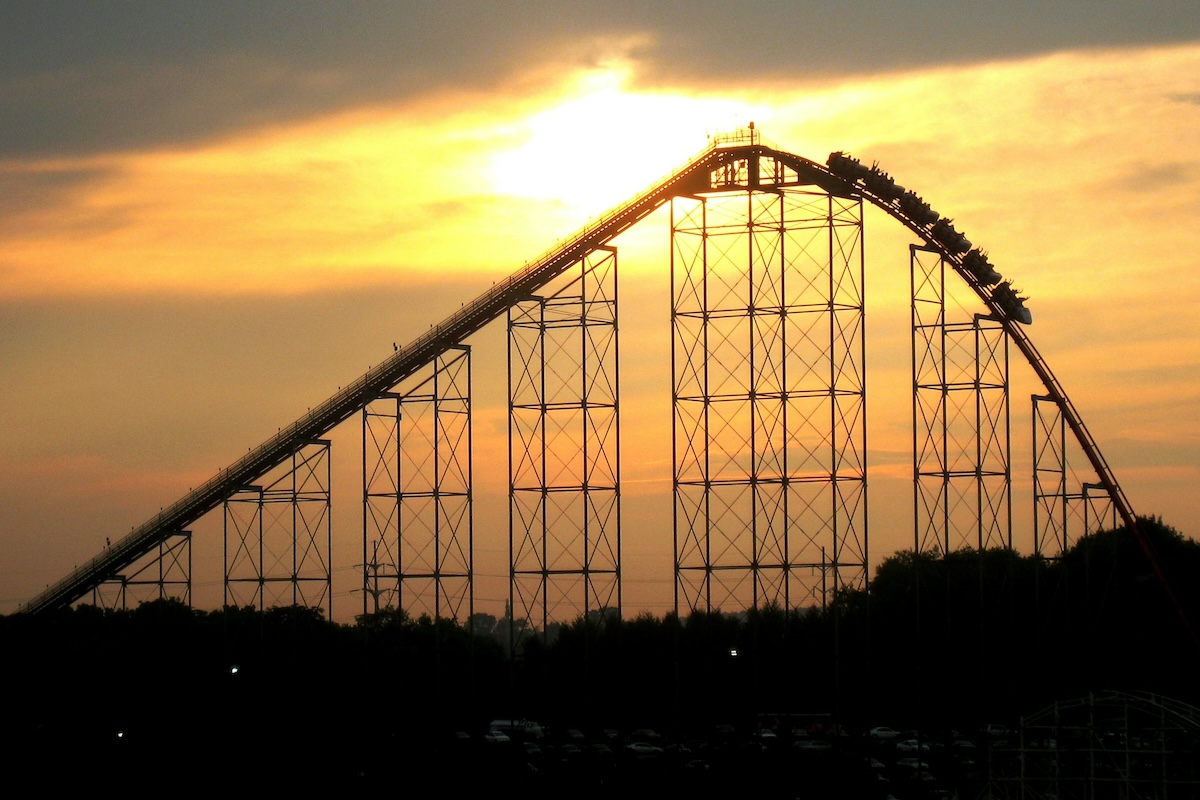 Silhouette of a roller coaster at sunset
