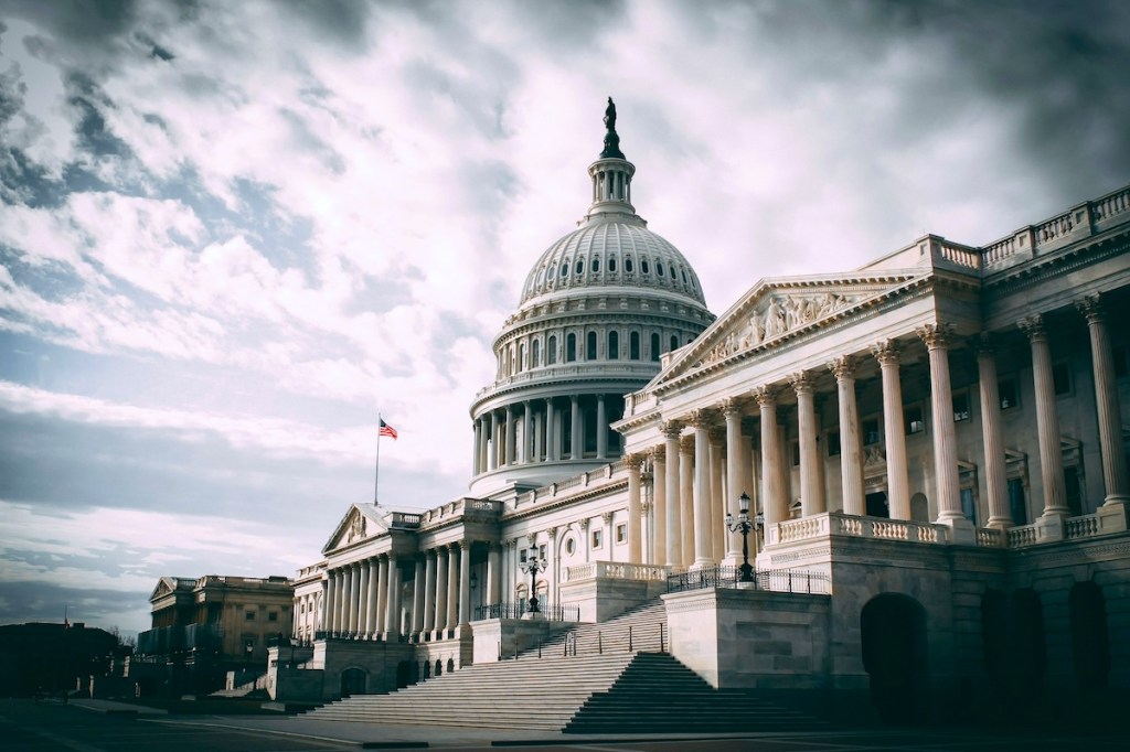 Capitol Hill in Washington D.C., under cloudy sky.jpg