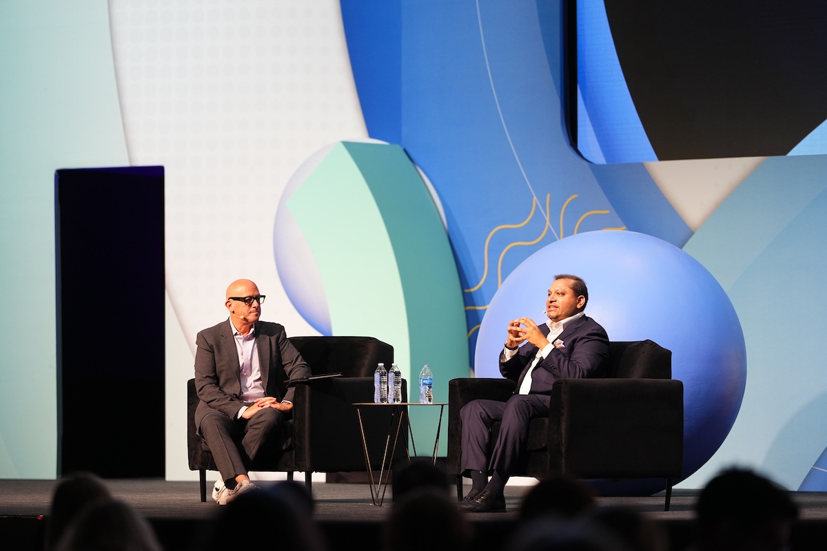 Cvent CEO Reggie Aggarwal on stage at Cvent Connect 2024