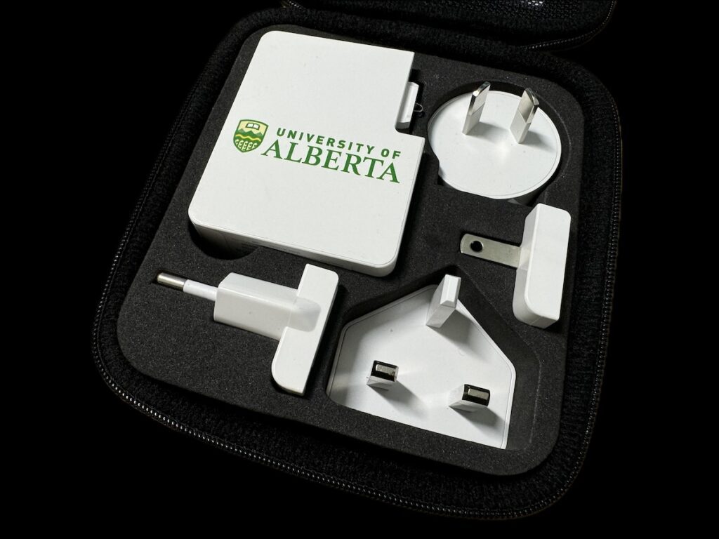 travel adapters in a case by university of alberta