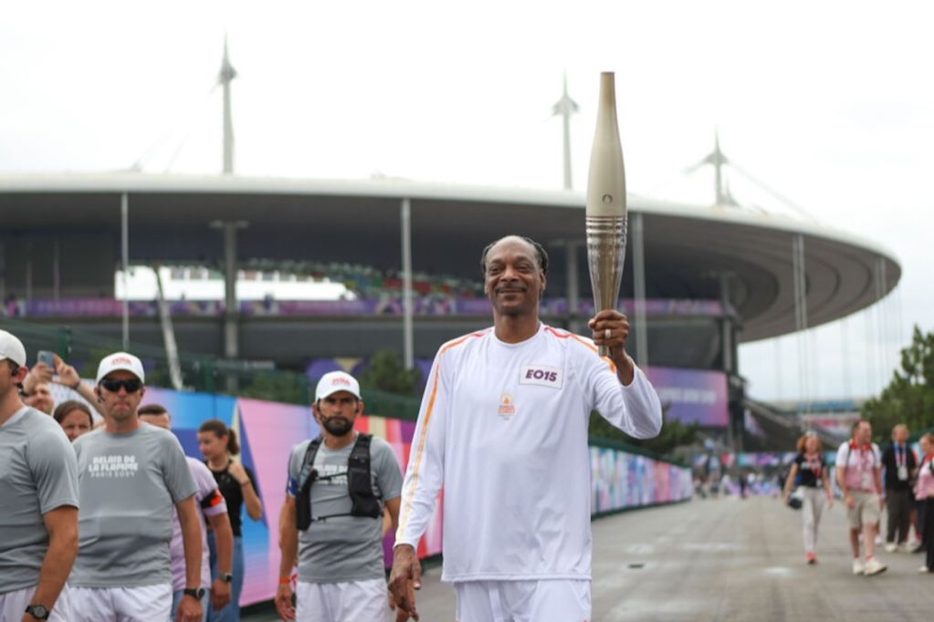 Snoop Dogg carrying Olympic torch