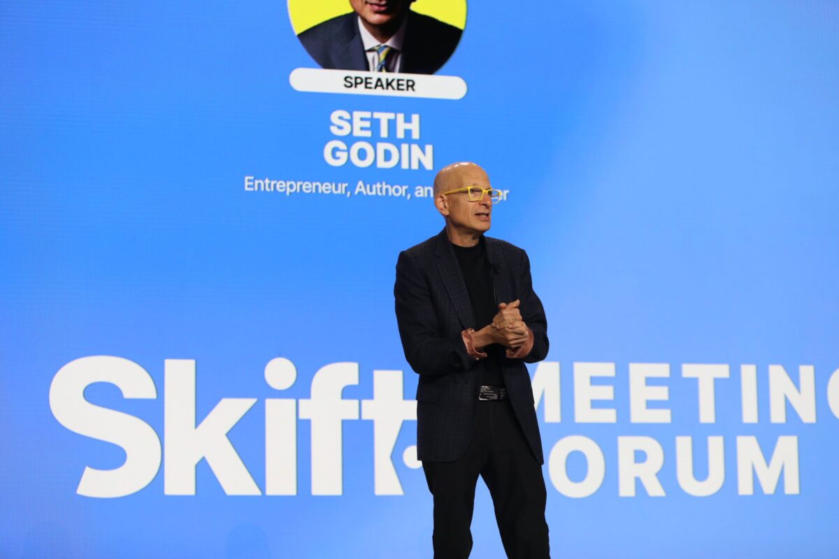 Seth Godin on stage at Skift Meetings Forum 2024