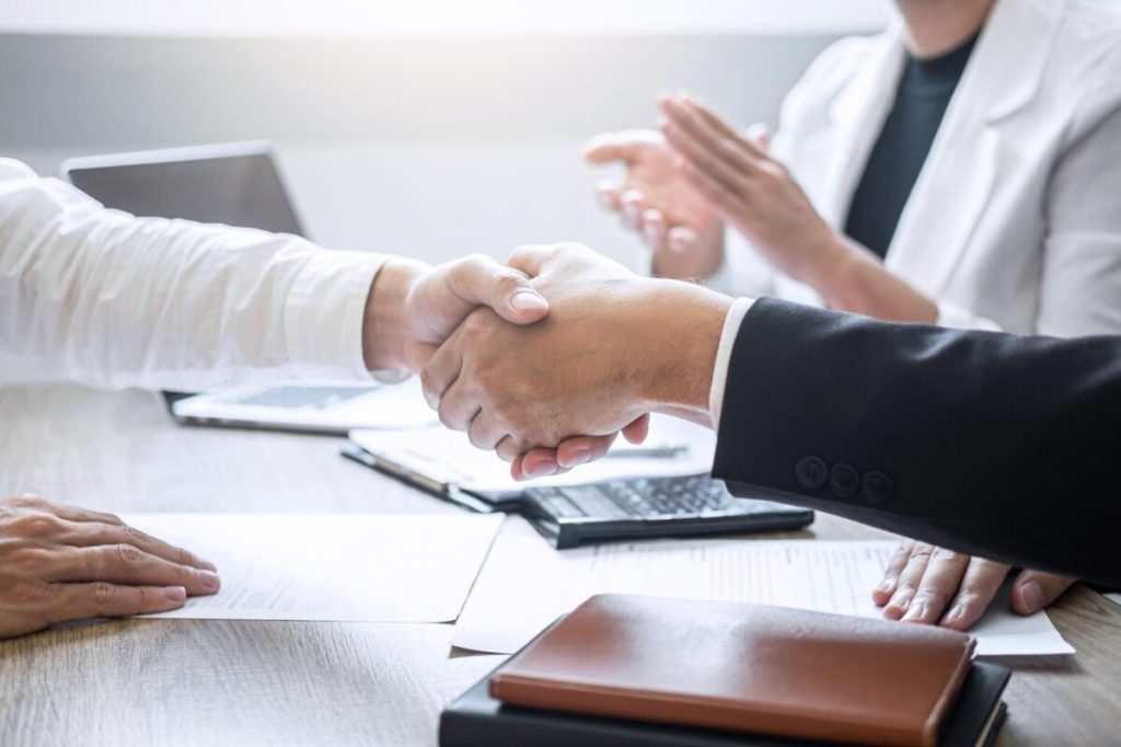 Handshake sealing a business deal.