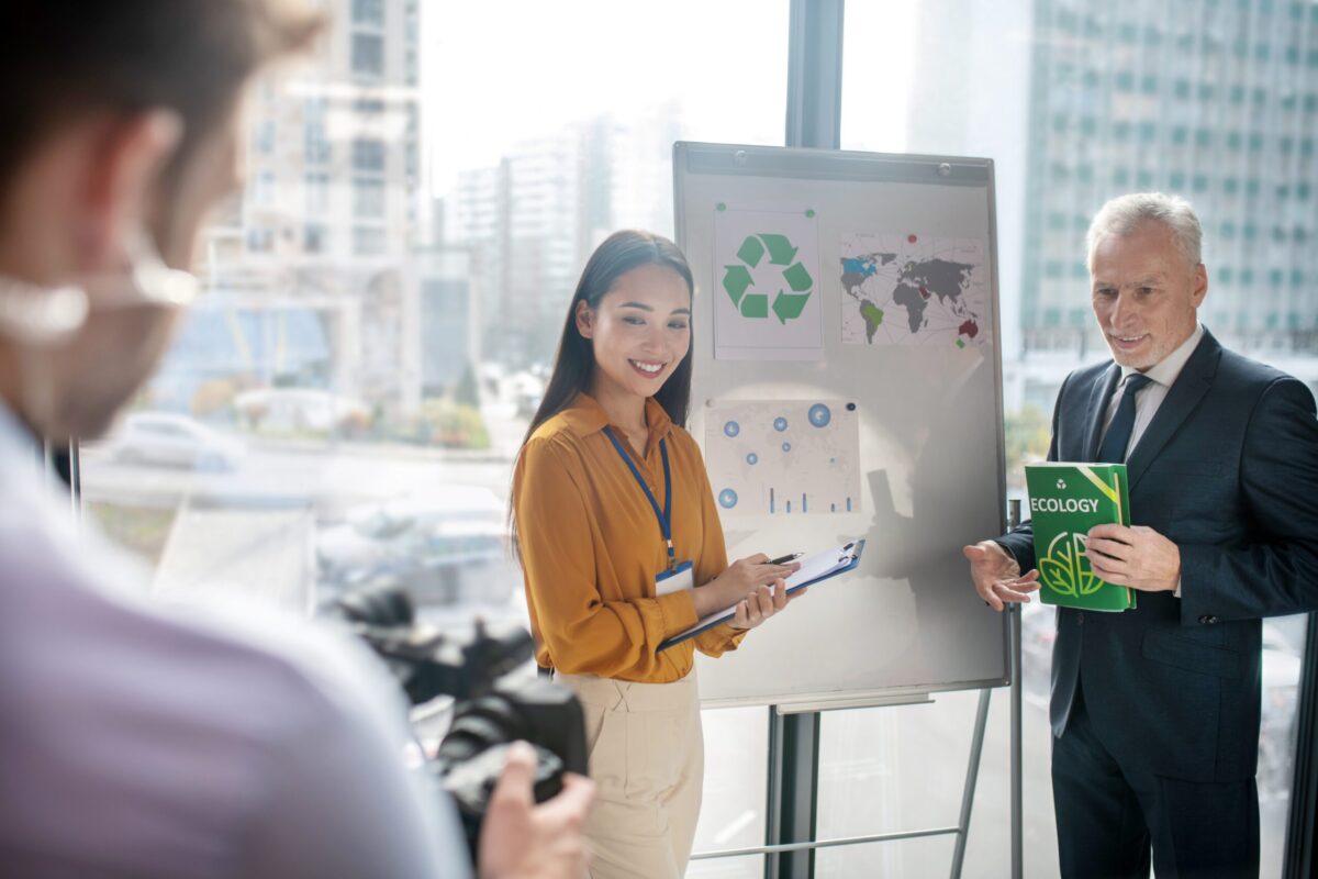 People looking at sustainability chart