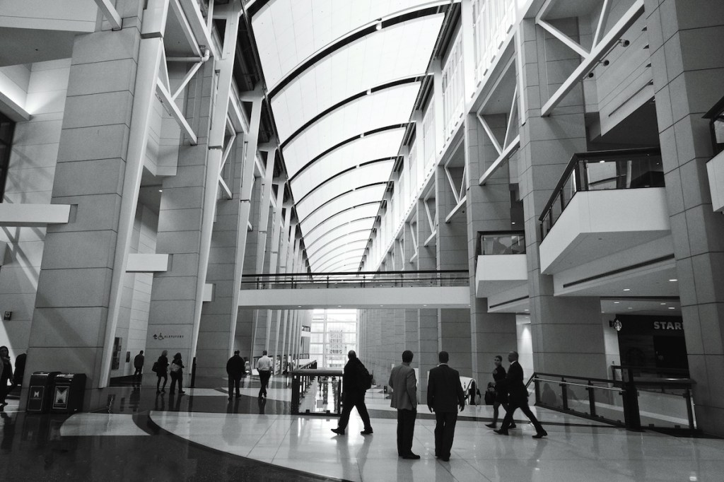 Black and white photo of lobby space inside McCormick Place in Chicago