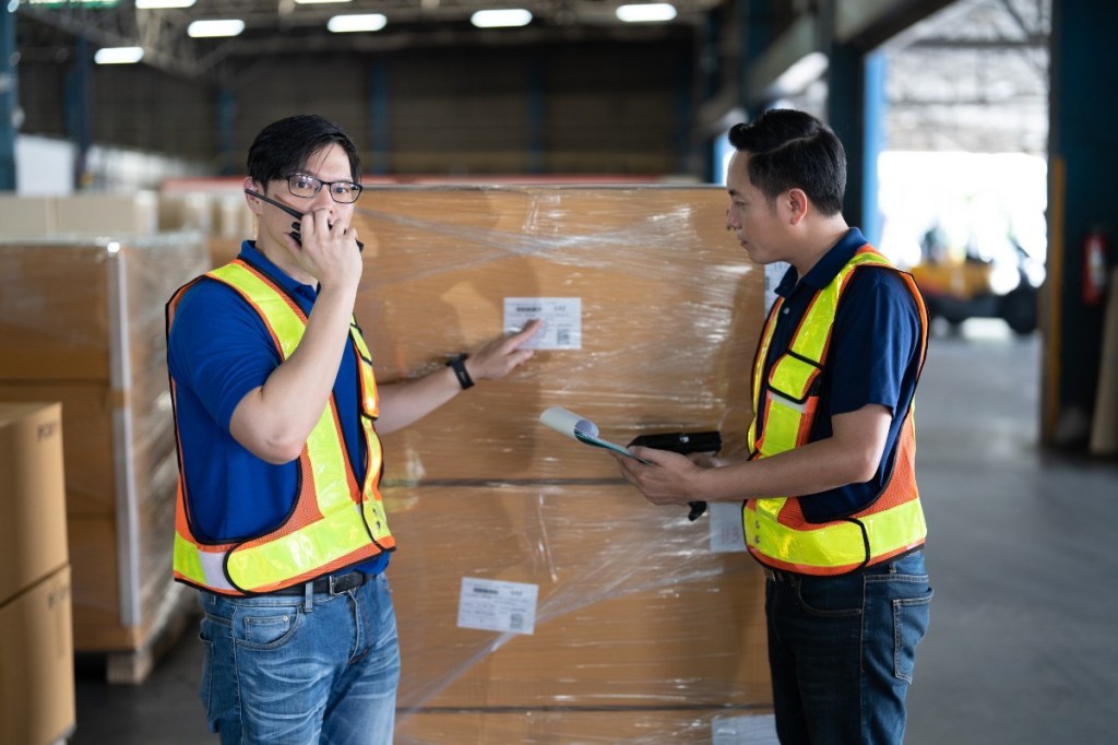 Customs officals inspect packages