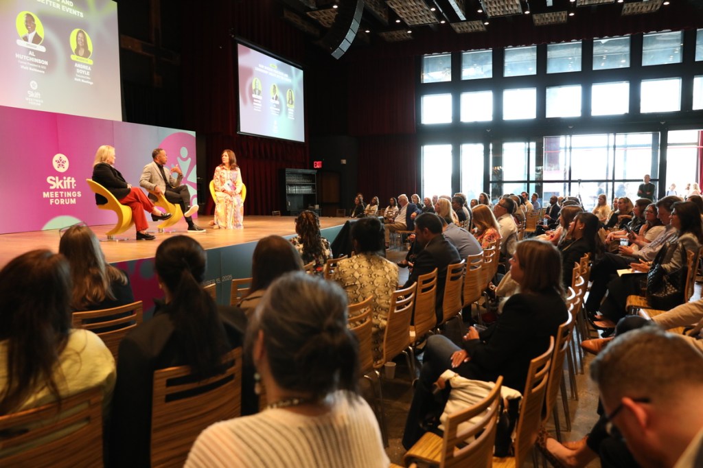 audience and speaker at a skift meetings forum session